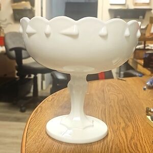 Milk glass pedestal fruit bowl.